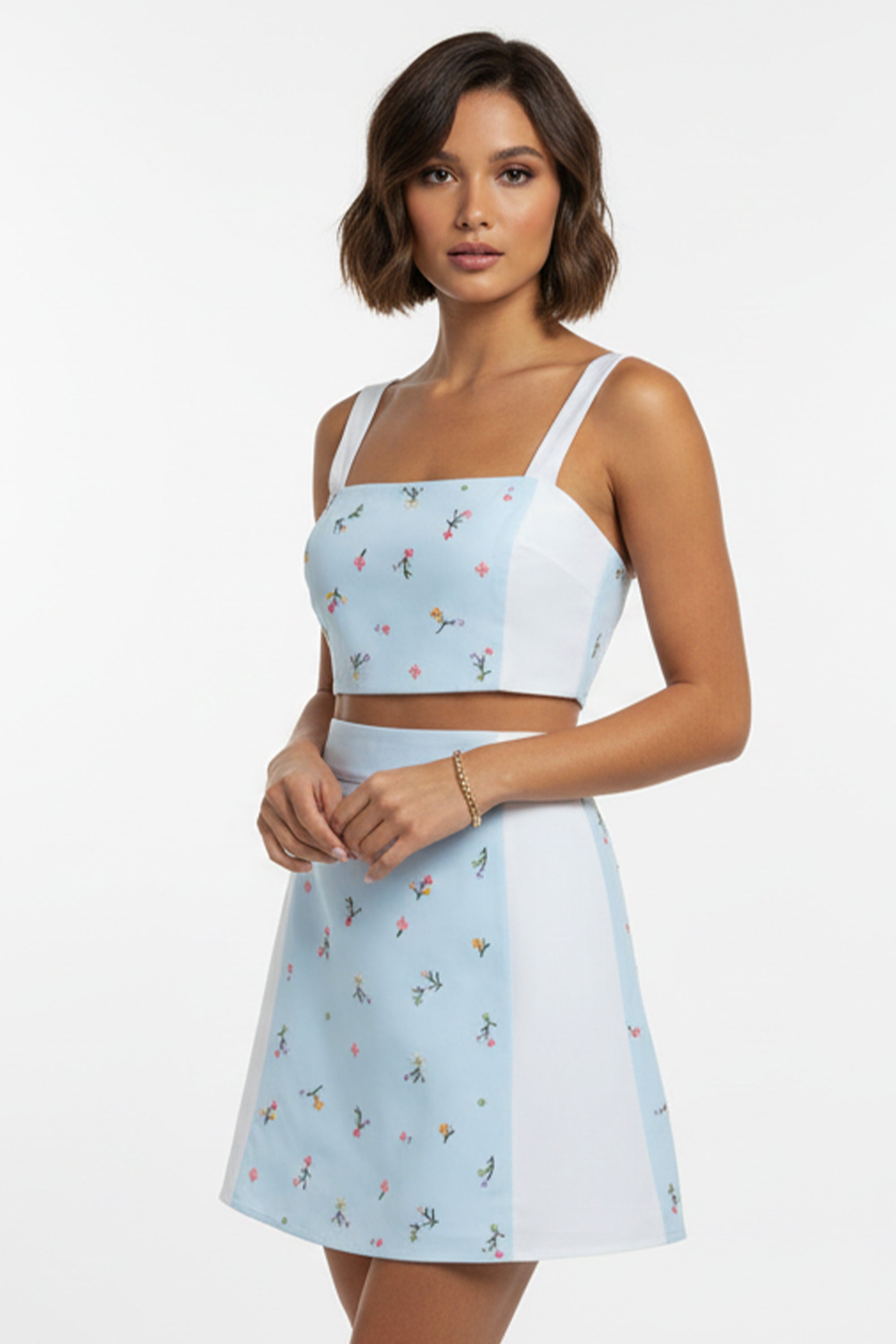 Model wearing Beatrice 2 Piece Mini Skirt set in Spring Blue.