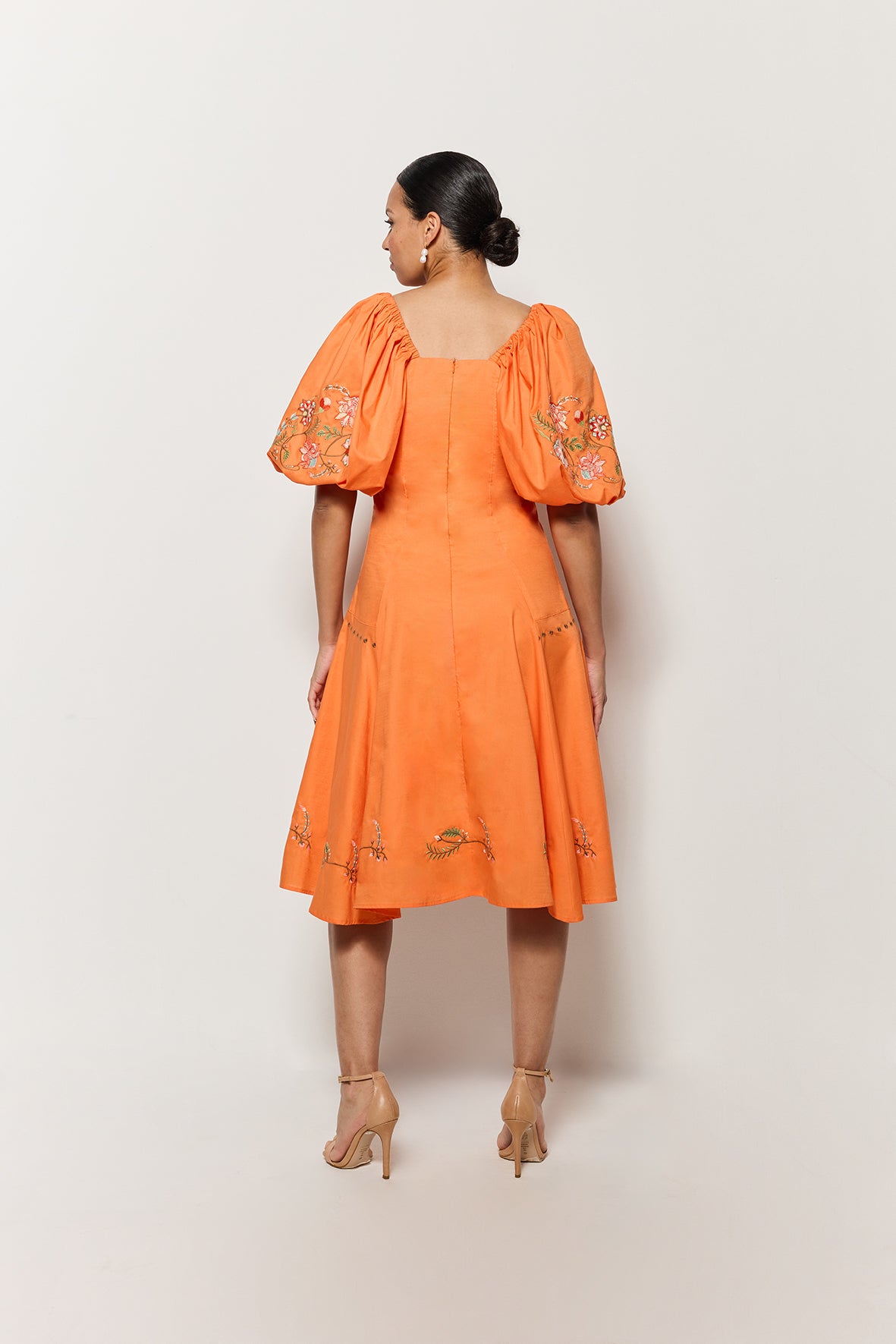 Backview of the Cacem Dress on Model. 