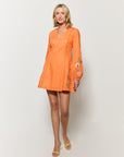 Chrozele mini cotton dress in orange showcasing long puff sleeve detail