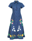 Fanm Mon Elena Dress with shirt collar, covered button-front closure, short sleeves, and floral embroidery throughout the skirt.