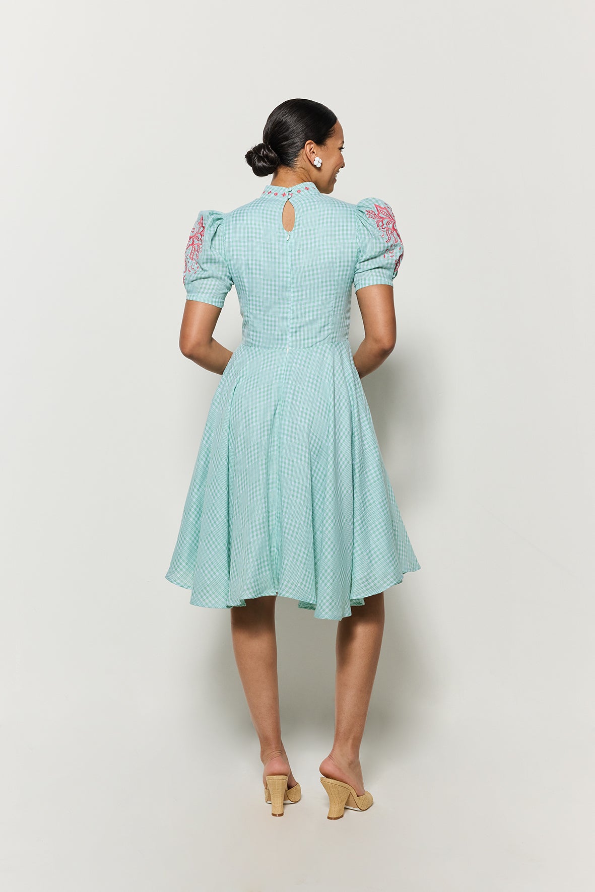 Model in Fanm Mon Lipno Dress backview showcase key hole back detail