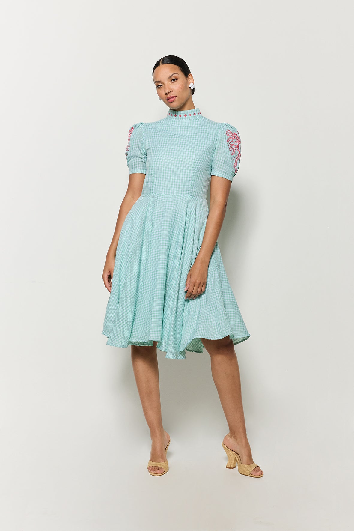 Front view of Model in Lipno Dress in Green Checker Plaid