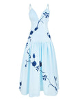 Paola Dress by Fanm Mon featuring oversized floral embroidery, adjustable straps, fitted bodice, and gathered midi skirt.