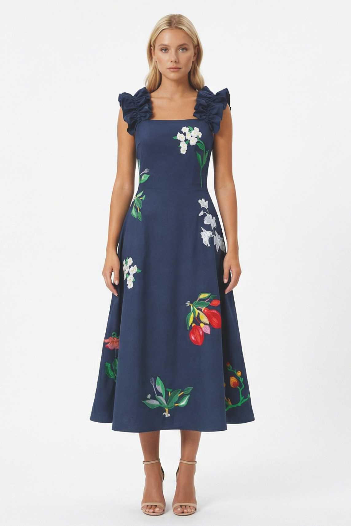 Front view of embroidered midi Tasya Fanm Mon dress featuring a square neckline, statement ruffle straps, and botanical floral embroidery.
