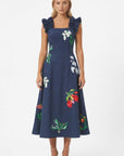 Front view of embroidered midi Tasya Fanm Mon dress featuring a square neckline, statement ruffle straps, and botanical floral embroidery.