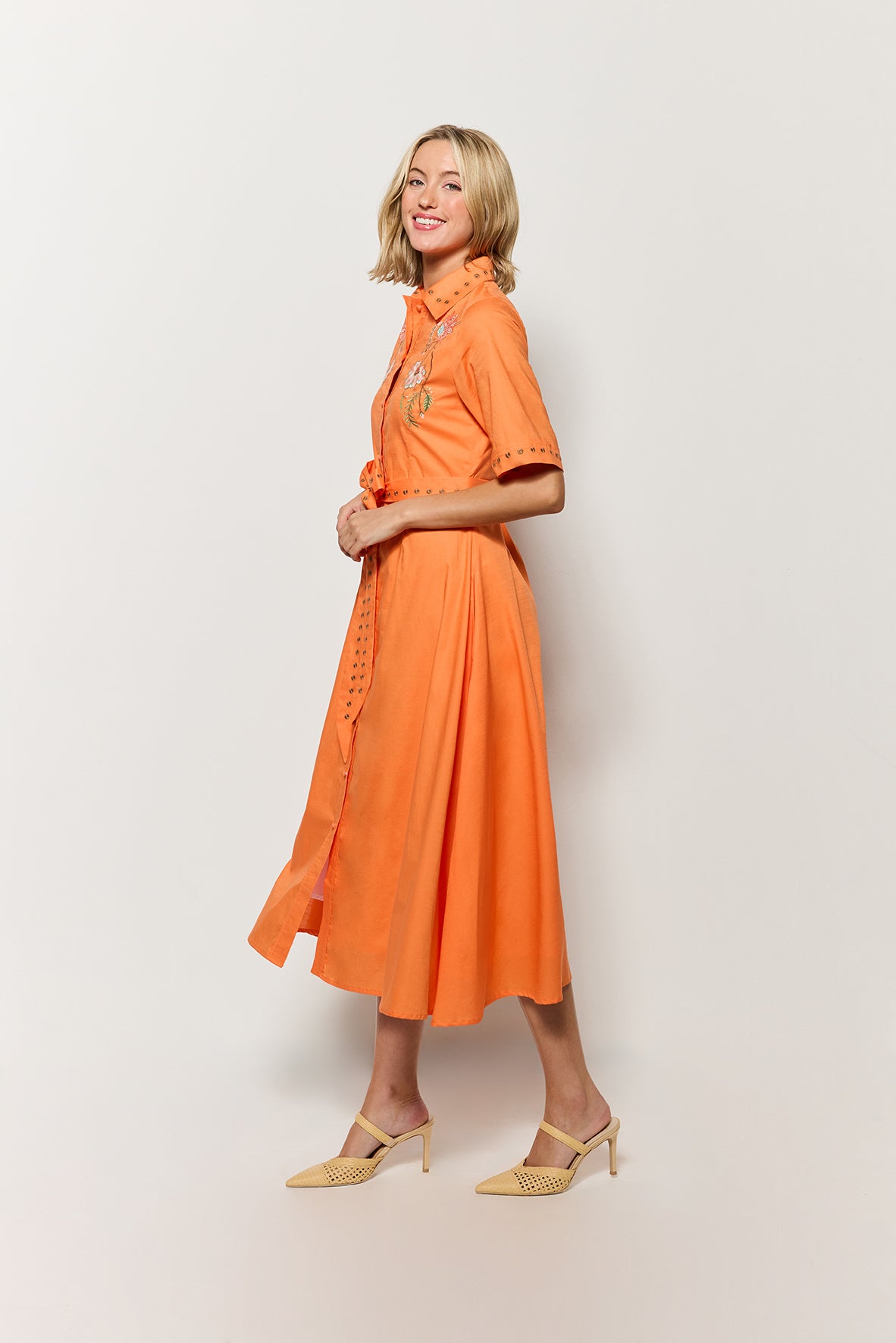 Sideview of the Fanm Mon Kenya Shirt Dress in Orange