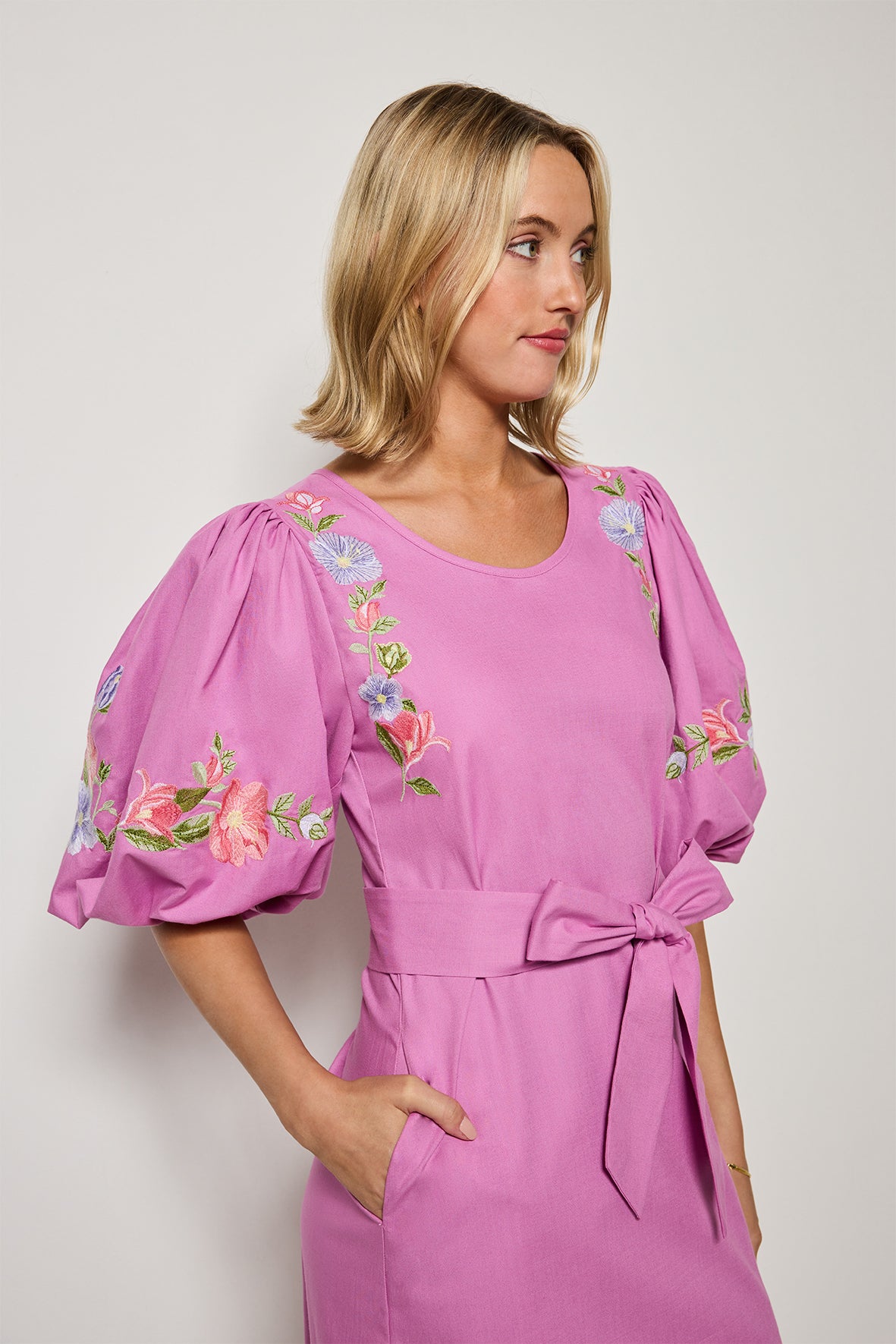 Fanm mon Kongo dress in deep plum cotton with floral embroidery.