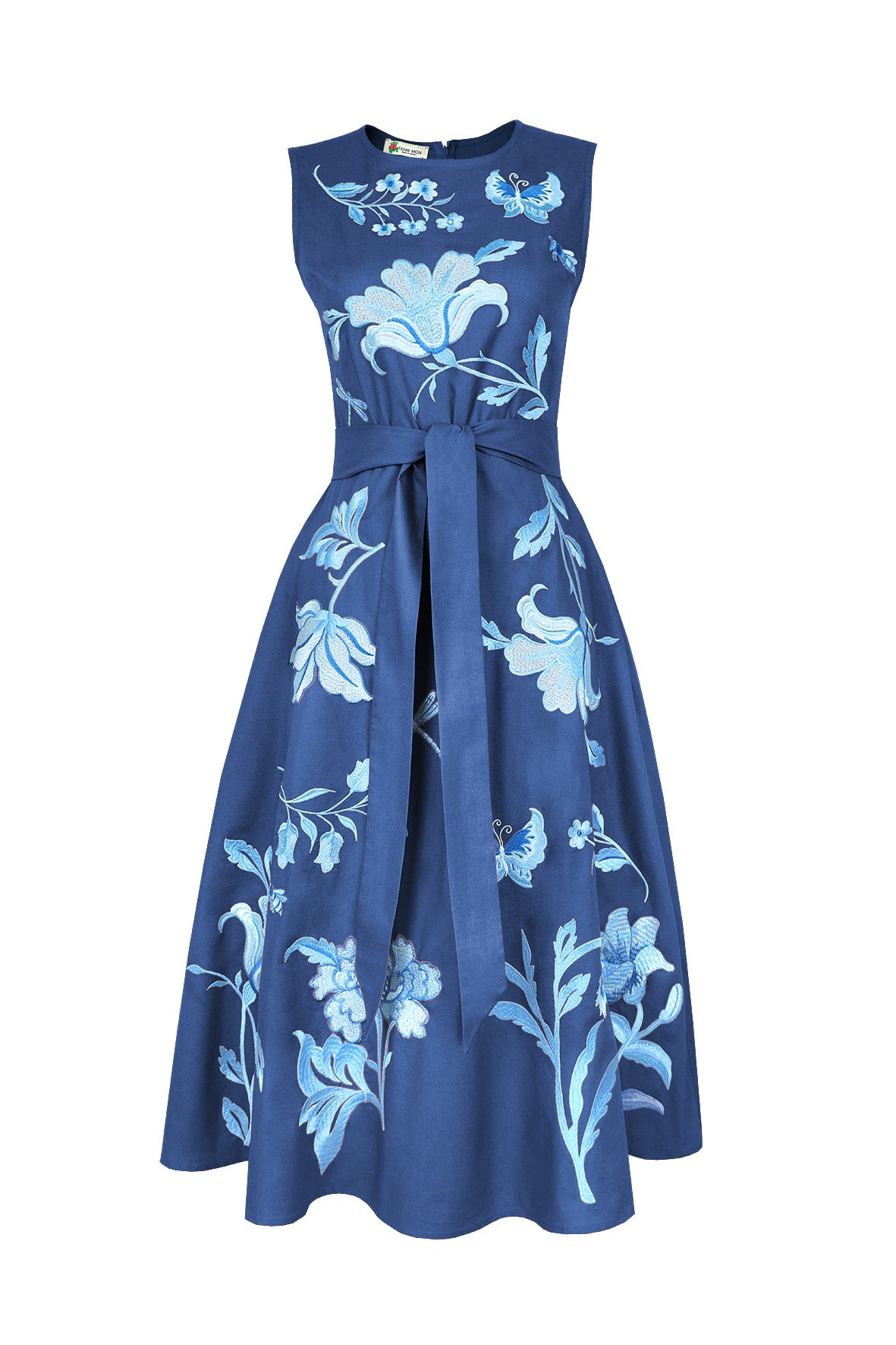 Fanm Mon Gera Dress in indigo blue featuring tonal blue botanical embroidery, butterfly motifs, a self-tie waist, and A-line midi skirt.