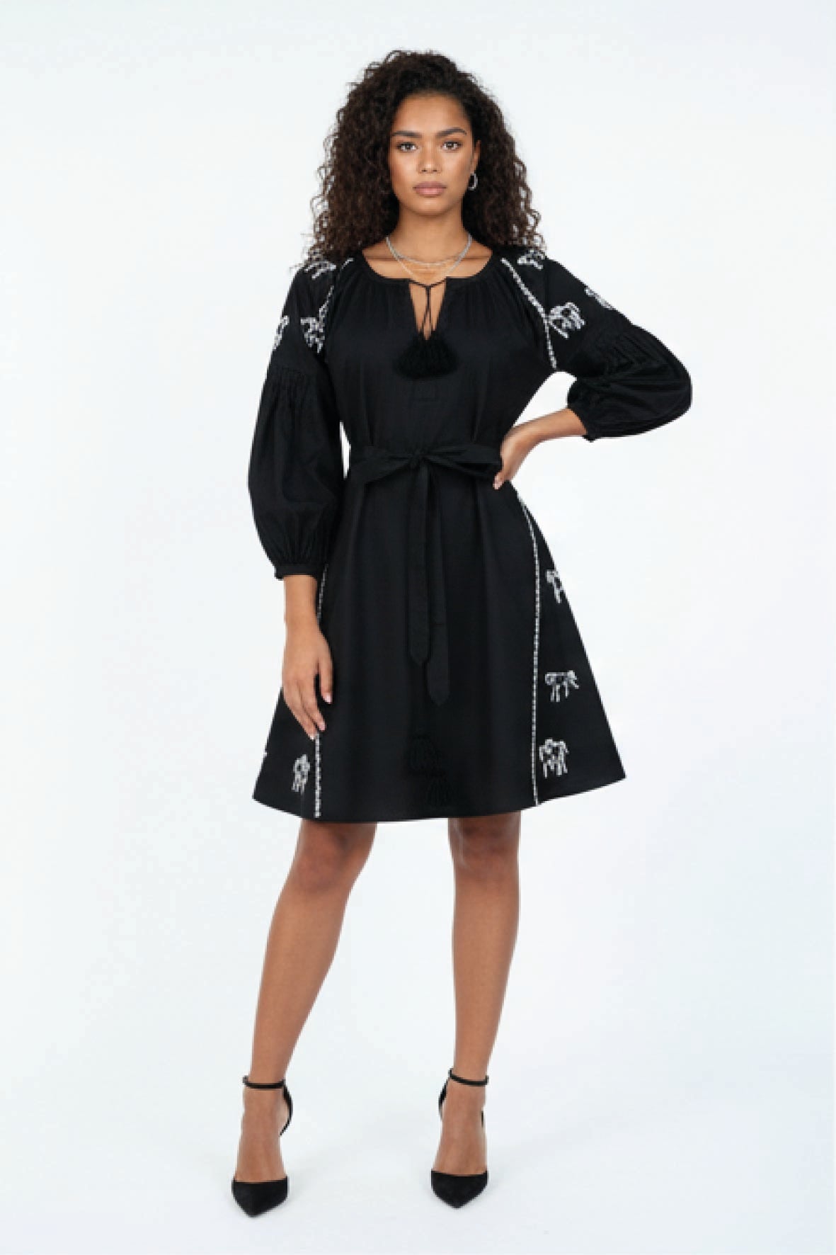 Model wearing the Fanm Mon Handan Dress featuring three-quarter balloon sleeves, equestrian-inspired embroidery, a self-tie waist, and A-line mini silhouette. Perfect for a rodeo party or a horse lover.
