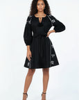 Model wearing the Fanm Mon Handan Dress featuring three-quarter balloon sleeves, equestrian-inspired embroidery, a self-tie waist, and A-line mini silhouette. Perfect for a rodeo party or a horse lover.