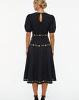 Back view of the Fanm Mon Lesley Dress showcasing the concealed back zipper with keyhole closure, fitted waist, embroidered daisy vine detailing, and flowing A-line midi skirt.