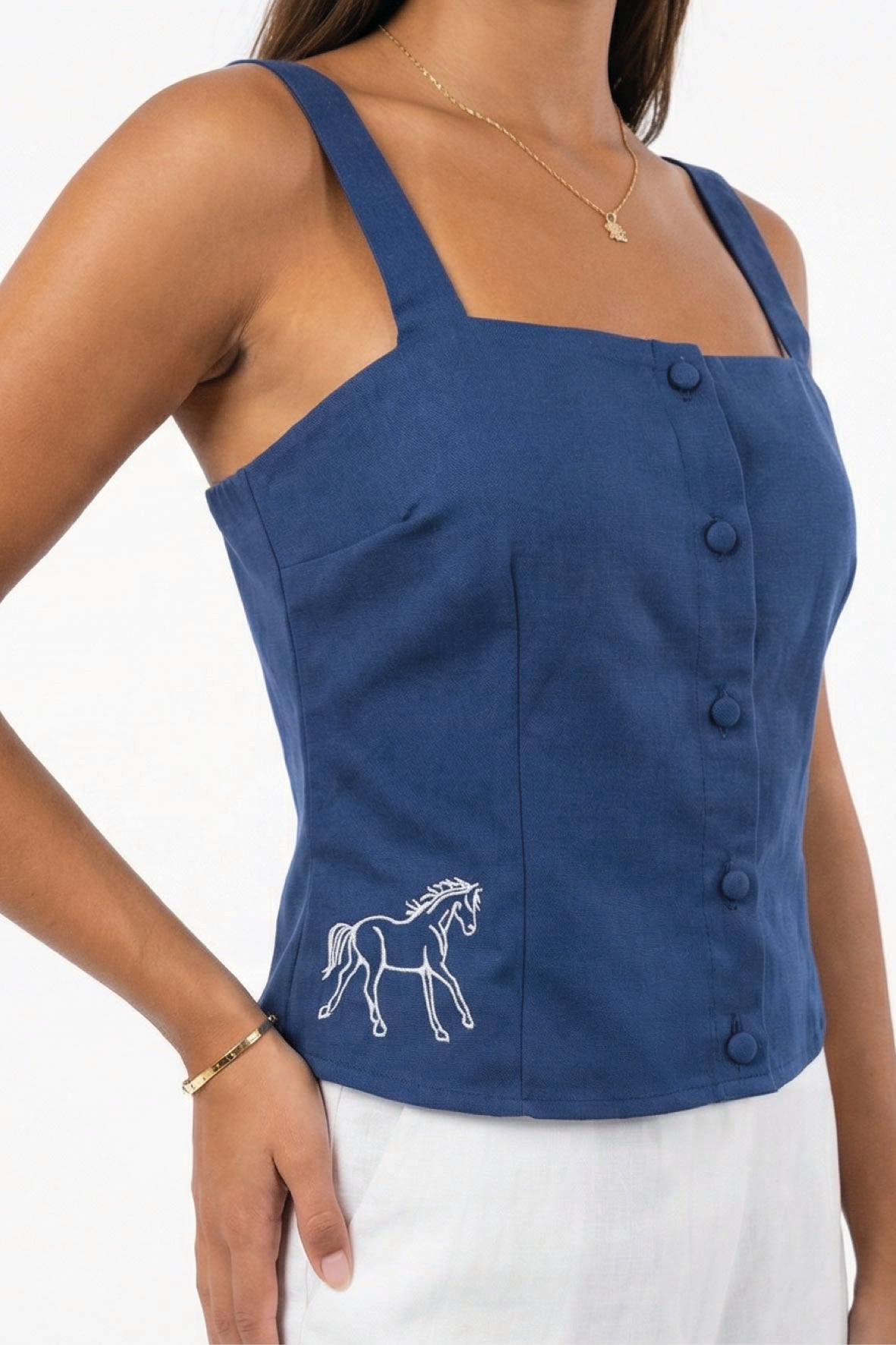 Fanm Mon May Top in deep blue with contrast horse embroidery and fabric-covered buttons
