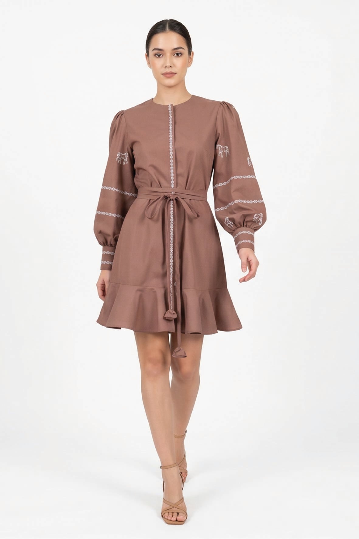 Fanm Mon Mel Dress on model featuring horse embroidery, voluminous long sleeves, a self-tie waist and ruffle mini hem