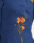 Fanm Mon Merva Top in deep blue with multicolor floral embroidery detail