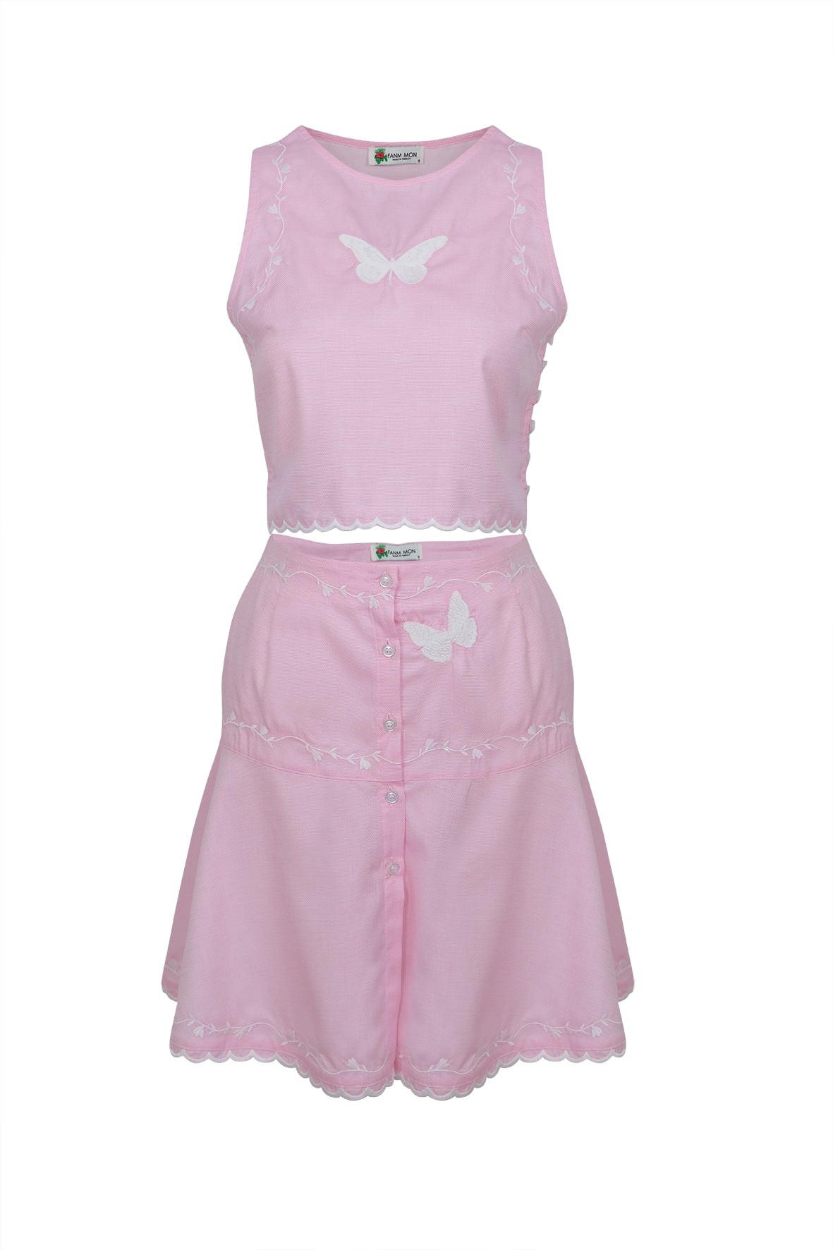 Pink Skirt and top with butterfly designs on a white background. Fanm Mon Nisa Set.