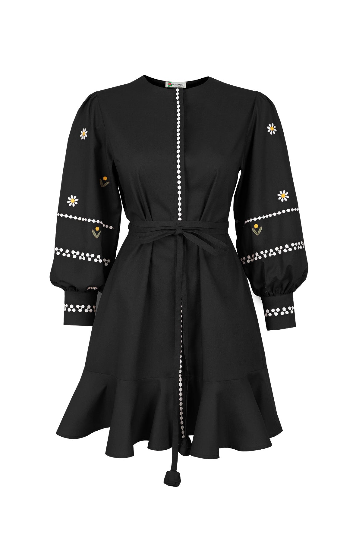 Fanm Mon Noen Dress in black with white daisy embroidery, long blouson sleeves, braided tie waist and ruffled mini hem