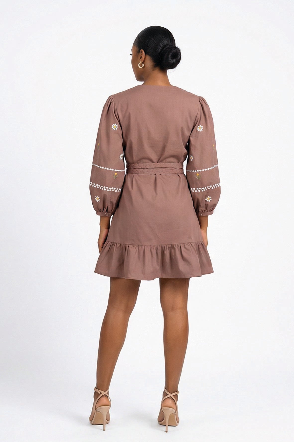 Fanm Mon Noen Dress back view featuring embroidered blouson sleeves, braided waist belt and ruffled mini hem.