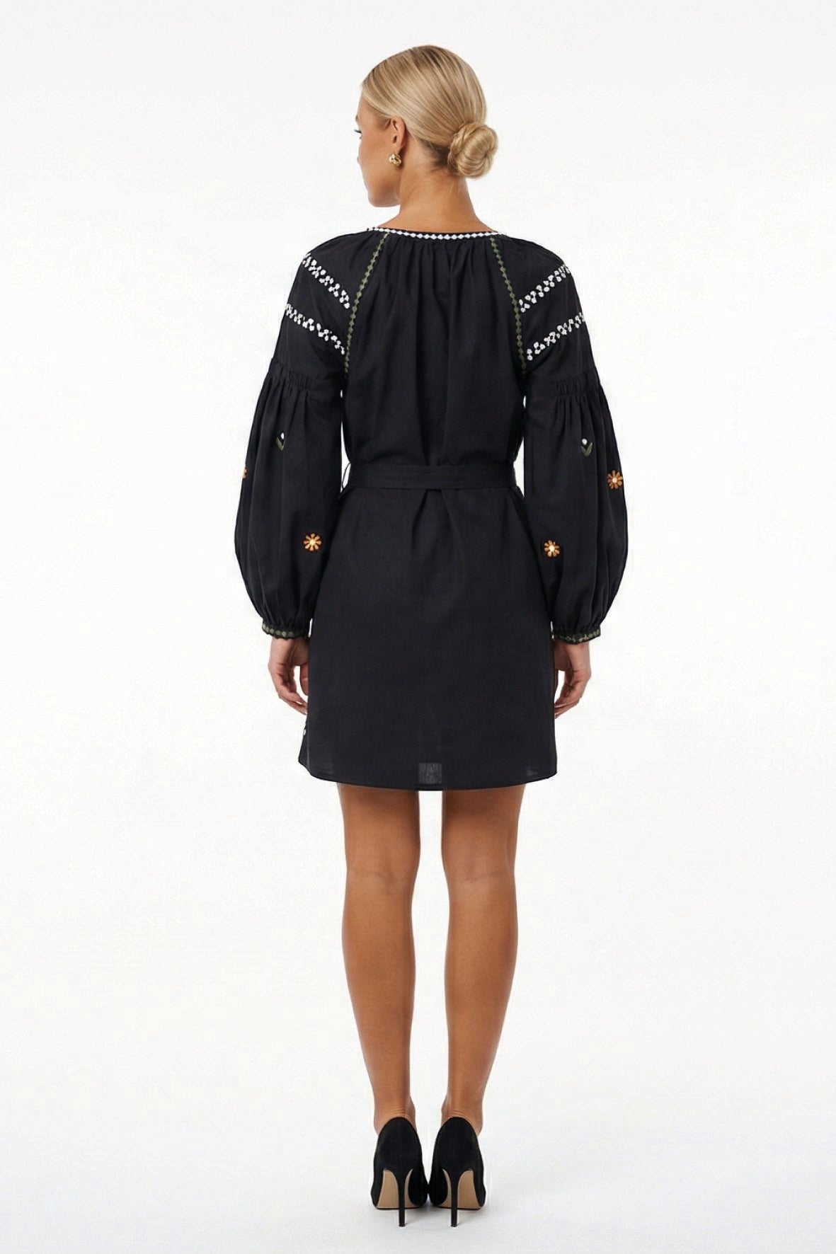 Back view of the Fanm Mon Stella Dress featuring long balloon sleeves, floral embroidery, contrast embroidered trim, and a self-tie waist.