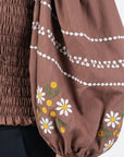 Fanm Mon Astrid Top in espresso with white daisy and floral embroidery on voluminous sleeve