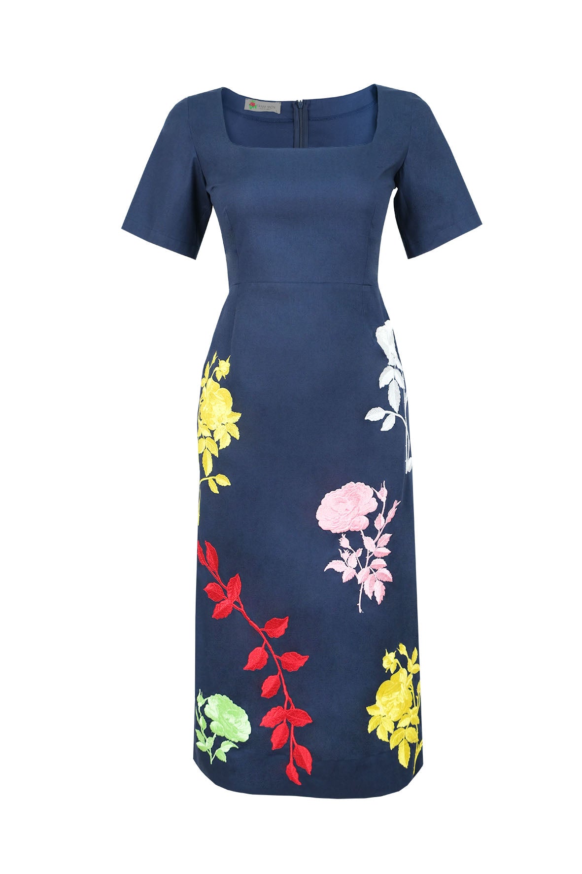 Fanm Mon Blanka Dress in indigo blue featuring a square neckline, short sleeves, fitted waist, and colorful rose embroidery across the midi skirt.