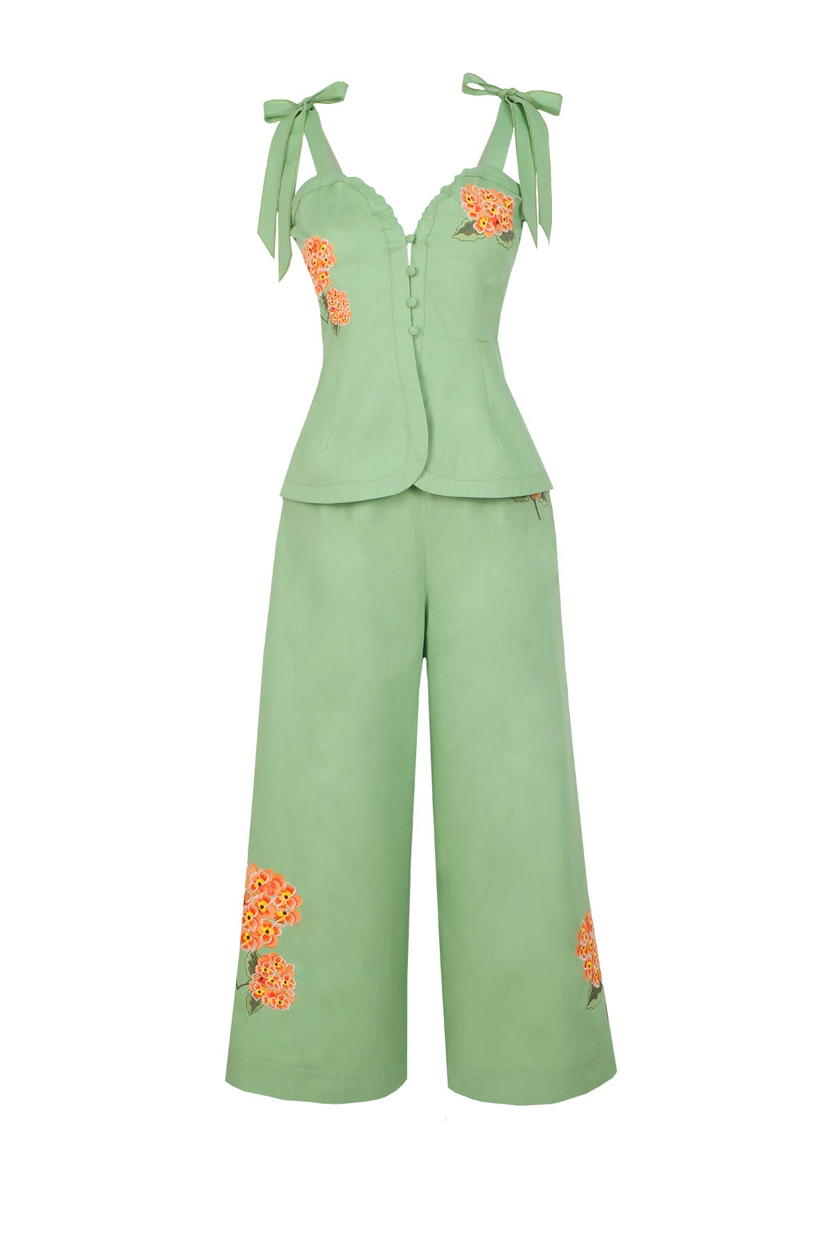 Fanm Mon Collette Set in green tea featuring a fitted button-front peplum top, tie shoulder straps, and wide-leg trousers with orange and yellow floral embroidery