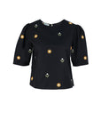 Fanm Mon Kehribar Top in black with scattered daisy floral embroidery and softly gathered short sleeves