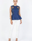 Fanm Mon Marena floral embroidered peplum top in deep blue on model