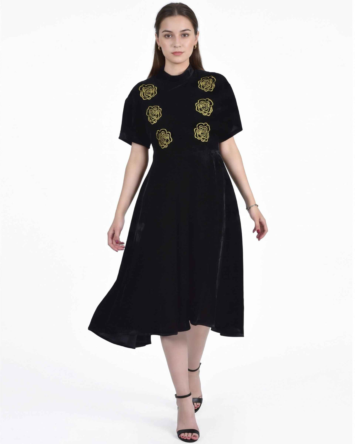 Fanm Mon Mehtap Dress on model in black velvet featuring gold rose embroidery, short kimono-style sleeves and a flared midi skirt