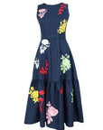 Fanm Mon Mihrap Dress with colorful botanical embroidery, defined waist and tiered midi skirt