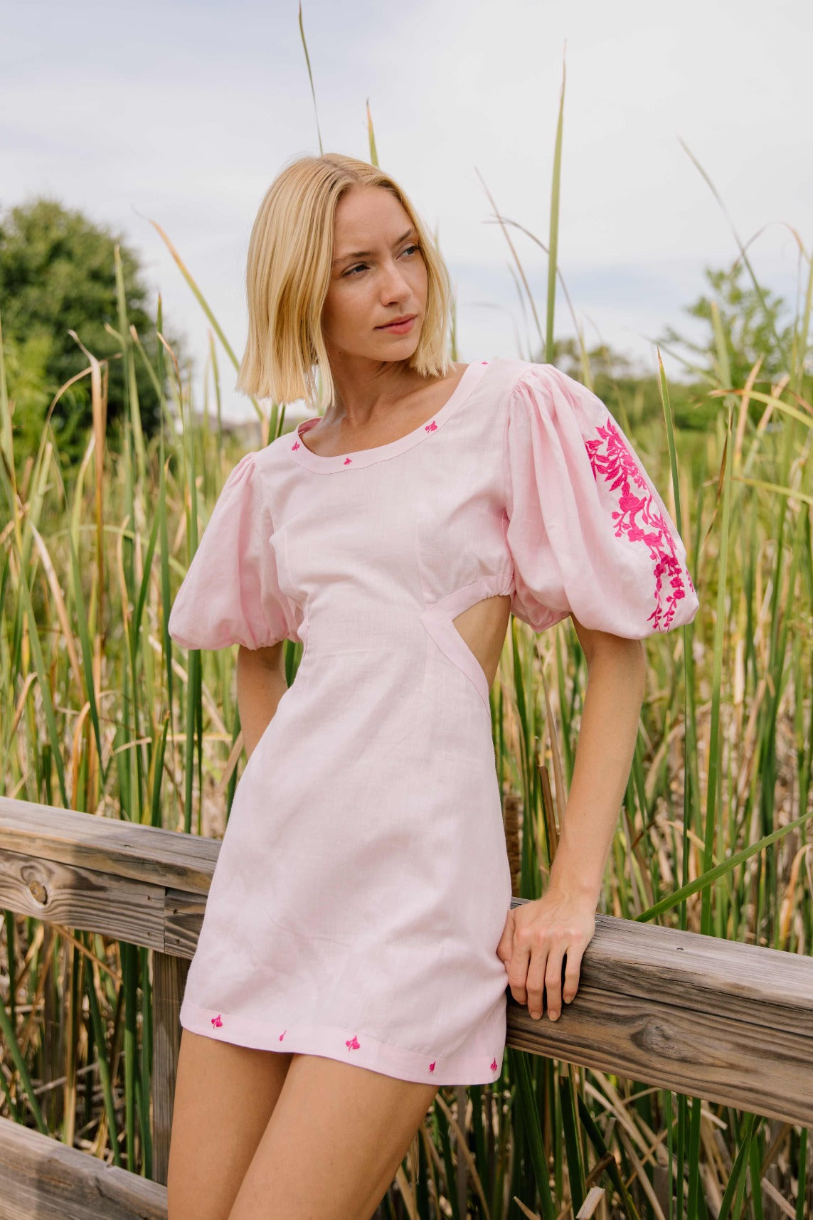 Mini Linen Dress with an open back with balloon sleeves embroidered dress. 
