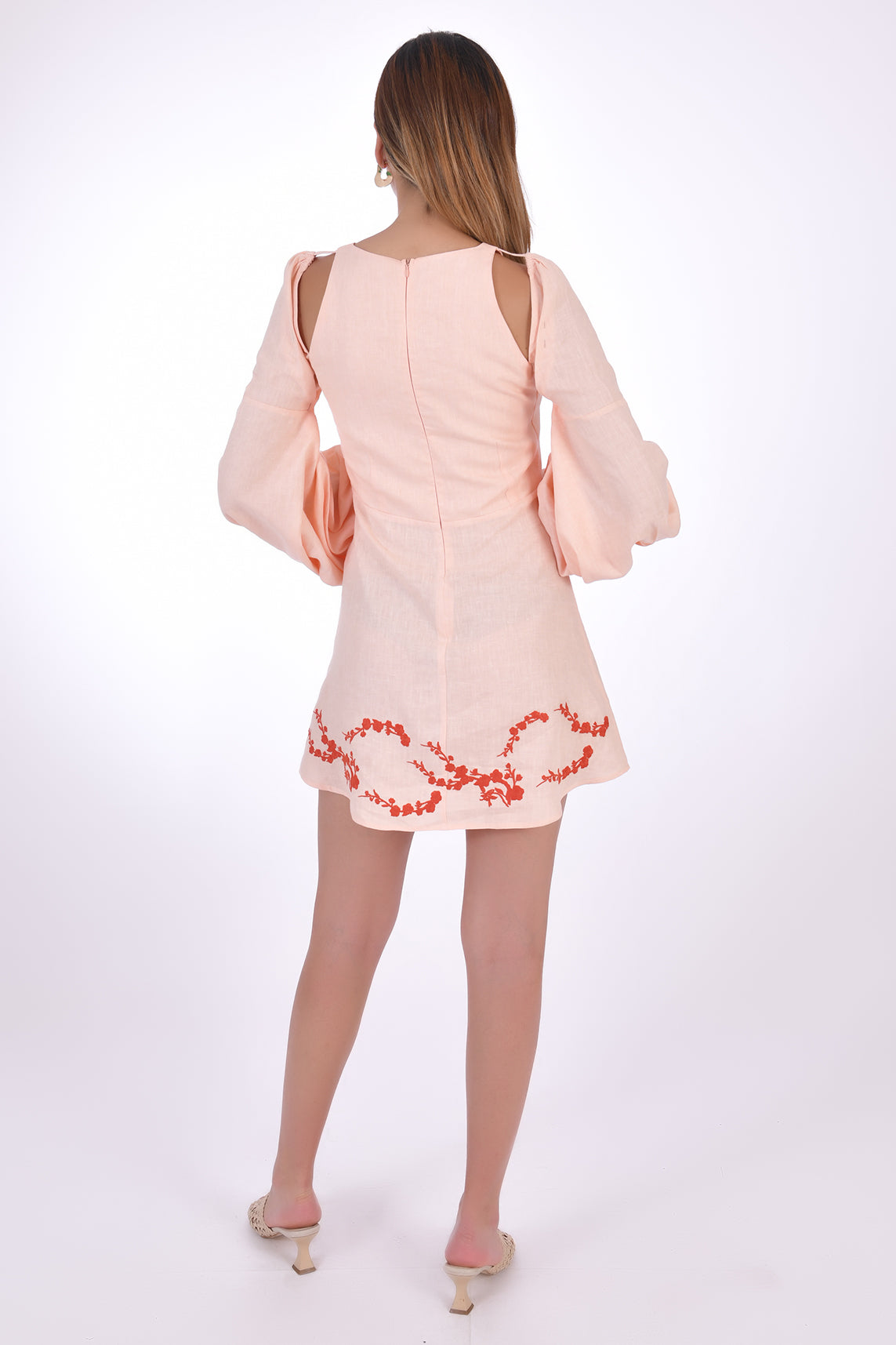 Fanm Mon Gizem Linen Mini Dress, showcasing back view with open shoulder detail and embroidery on hem. 