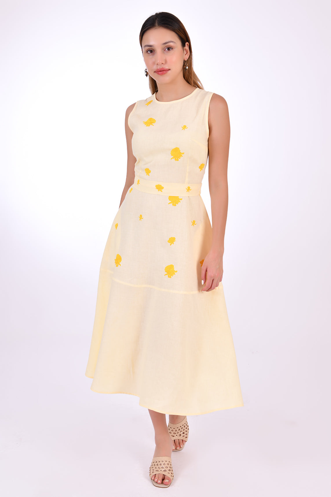 Fanm Mon Midi Linen Elvan Dress.  This beautiful A-line silhouette is crafted in breathable linen and features stunning front and back embroidery, side pockets, and a classic belted waist.  Front View.