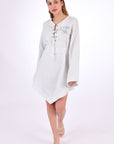 Fanm Mon Boze Dress, Front View alternative. Kaftan Style Linen Dress with wide kimono embroidered sleeves and handkerchief hem and tie front.  Easy slip-on wear,  mini length loose fit dress. 